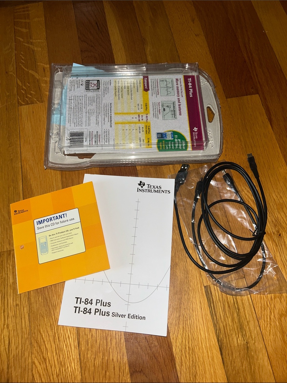 Texas Instruments TI 84 Plus Silver Edition Guide Book, CD, & replacement cords